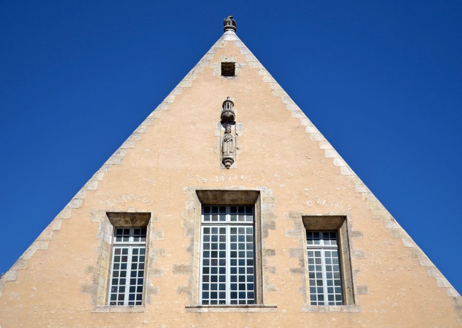 Facade detail of the ancient covered market in La Ferté-Bernard