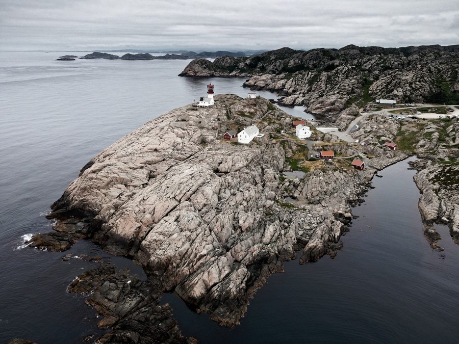 Lindesnes Lighthouse on a rocky coastal headland at Norway’s southern tip.