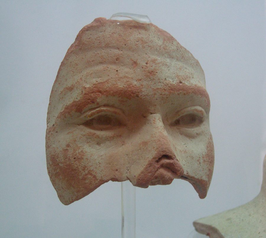 Earthenware mask in the Neapolis Museum in Nabeul, Tunisia