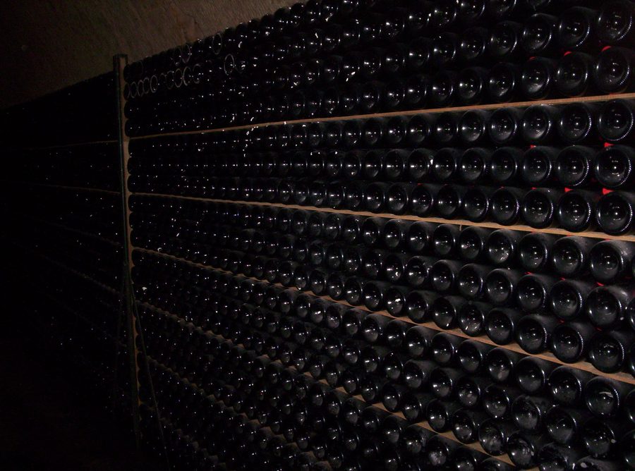 Alignment of bottles during a visit to the Mercier cellars in Épernay, Marne, France