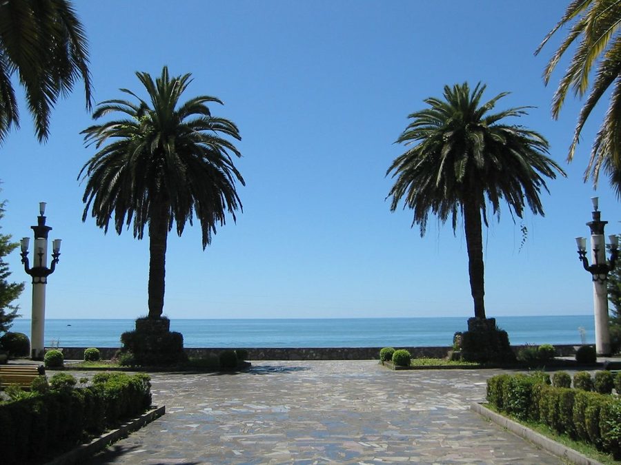 Esplanade in Gagra with the Black Sea and the Caucasus Mountains in the background.