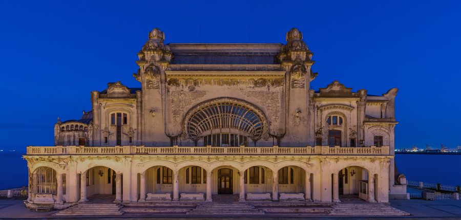 Constanța Casino on the Black Sea seafront in Constanța, Romania, at blue hour