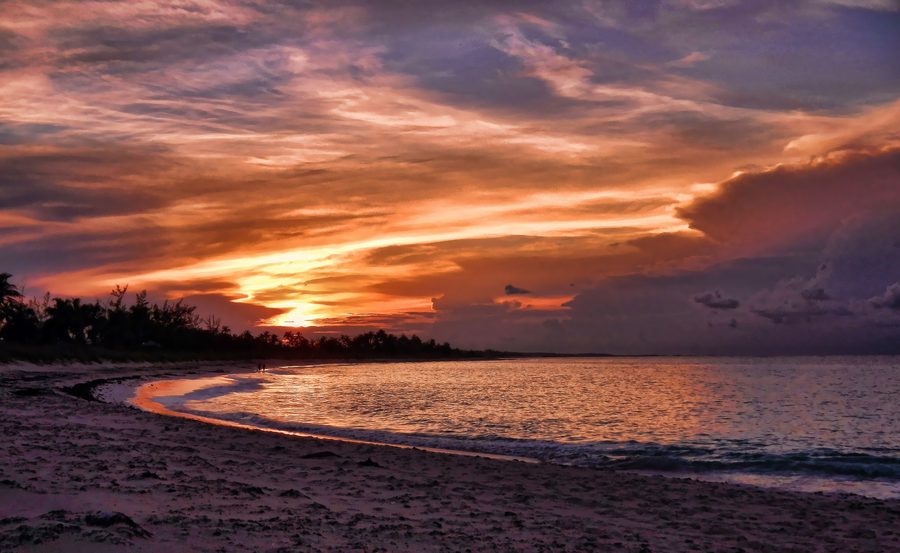 Sunset on a beach along Eleuthera’s Atlantic coast in the Bahamas