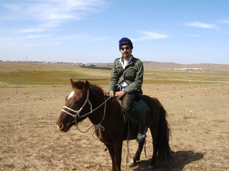 Reiter im Xilamuren-Grasland nahe Hohhot, Innere Mongolei