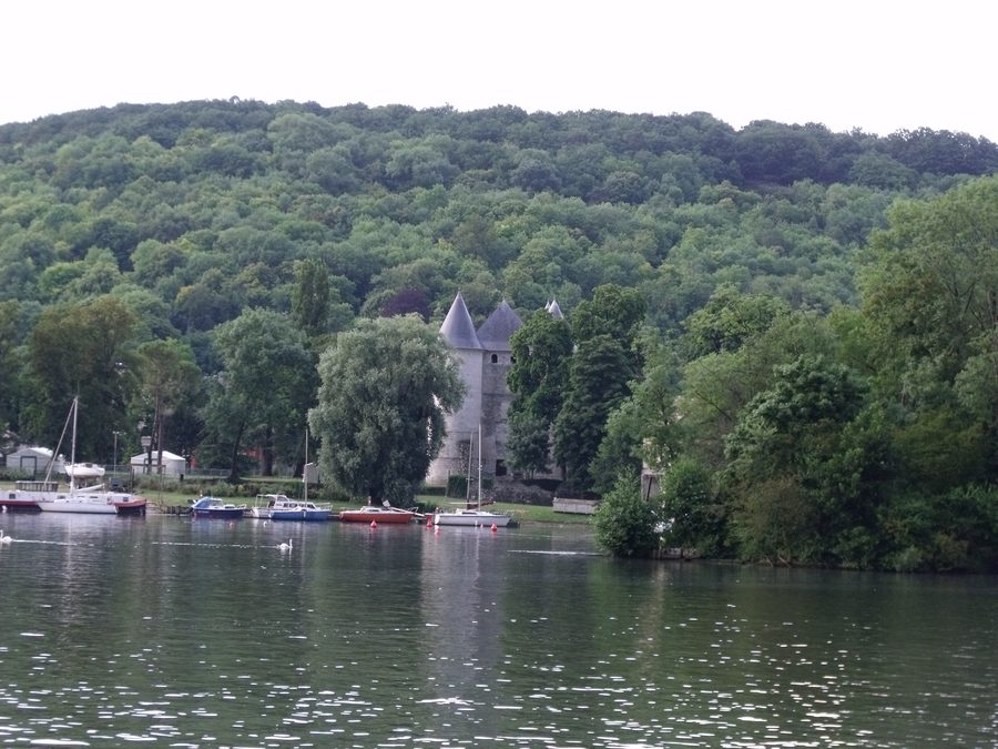 The River Seine flowing past Vernon and the Château des Tourelles