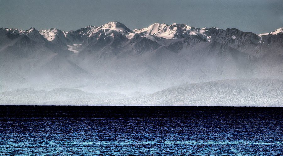 Issyk-Kul Lake with the Tianshan Mountains in the background.
