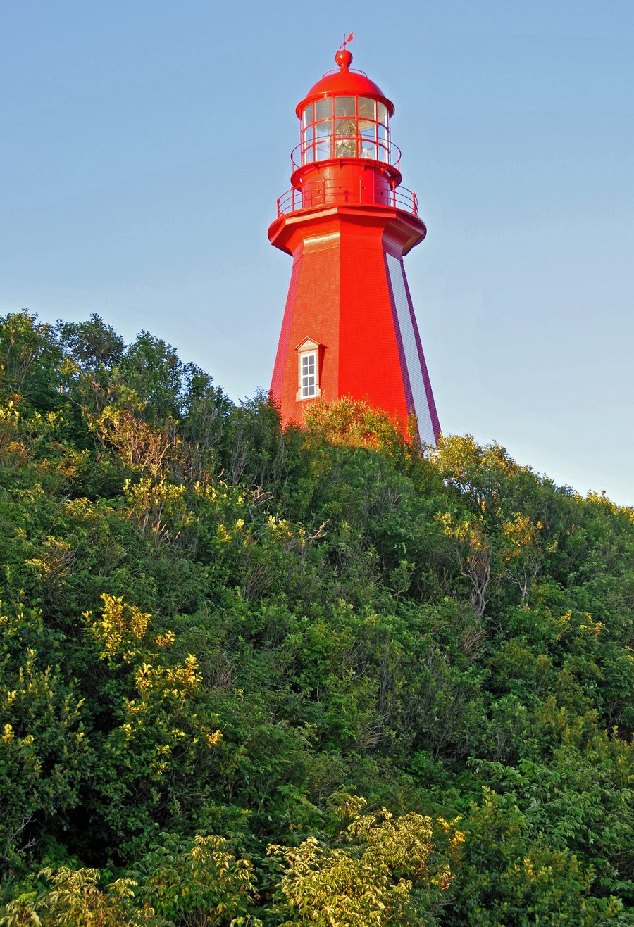 Red wooden La Martre Lighthouse on the Gaspé coast